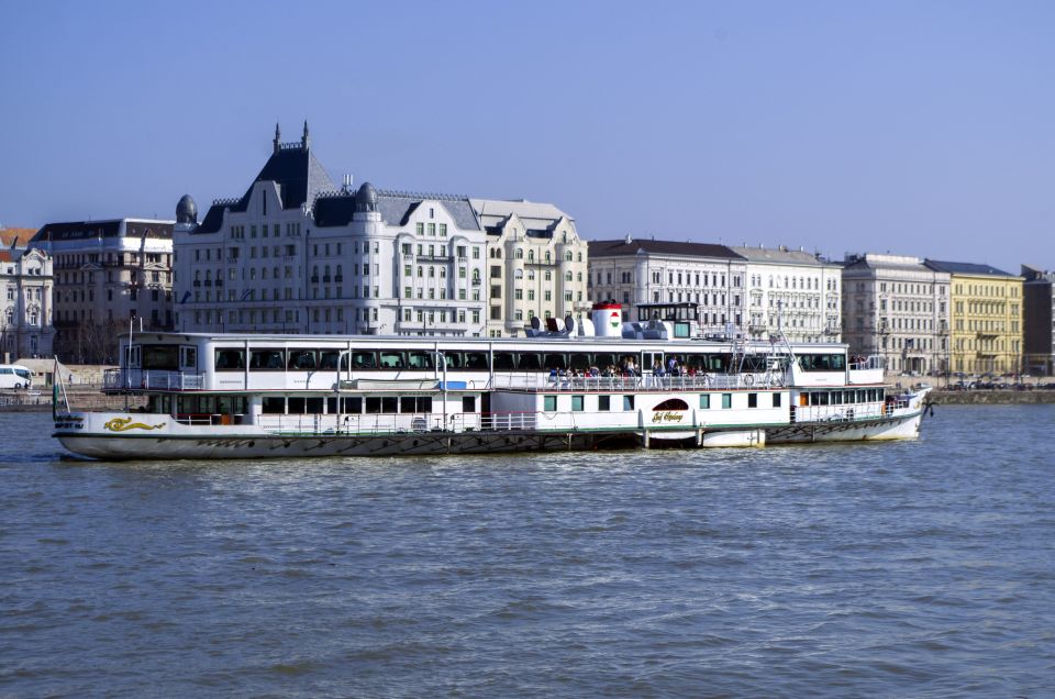 Budapest: 1 hr Sunshine Booze Cruise with Prosecco - Boarding at Akadémia dock 2, then heading toward the Parliament views