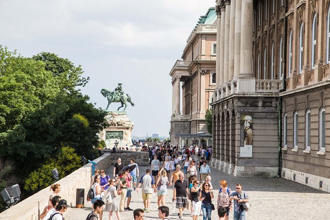 Budapest Castle Walk - Stop 2: St. Matthias Church—tiled roof, interior time, and WWII scars