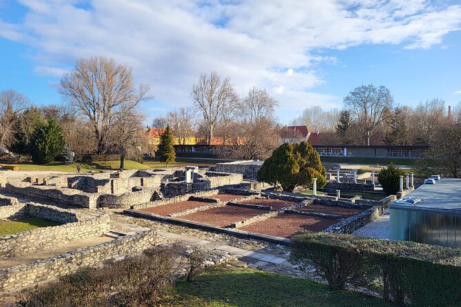 Budapest Hidden Gems - Roman Aquincum Private Tour - Hercules Villa mosaics between socialist-era apartment buildings